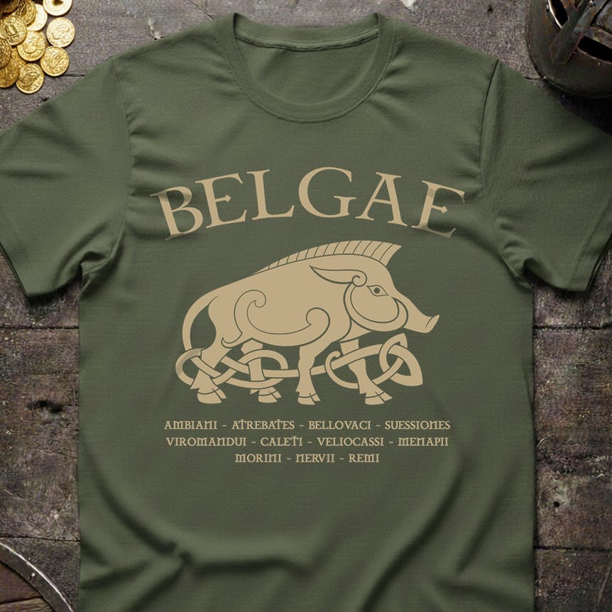 Green t-shirt with 'BELGAE' and pig design on a rustic wooden surface.
