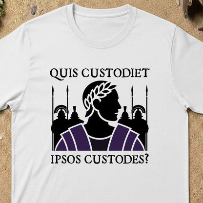 Quis Custodiet Ipsos Custodes? White t-shirt with a graphic design featuring a silhouette of a Roman emperor and text on a sandy background.