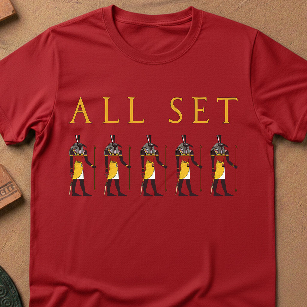 Red t-shirt with 'ALL SET' text and Egyptian god illustrations on a beige background