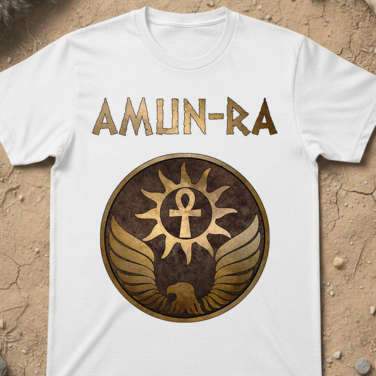 White t-shirt with 'AMUN-RA' design on a sandy background