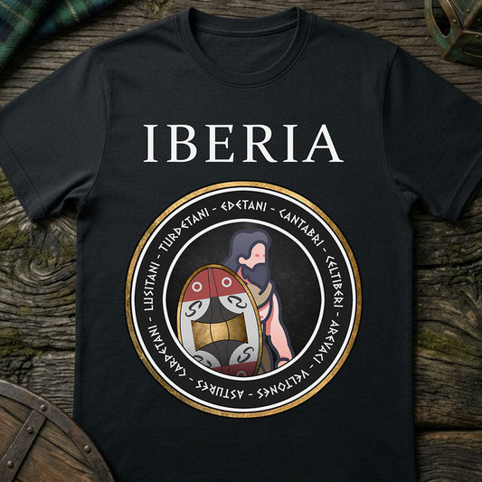 Black t-shirt with 'IBERIA' design featuring a warrior and shield on a wooden surface.