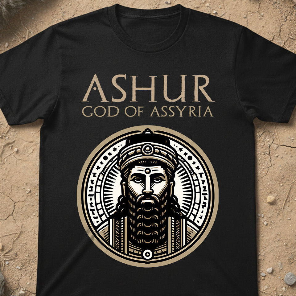 Black t-shirt with 'Ashur, God of Assyria' design on a textured beige background