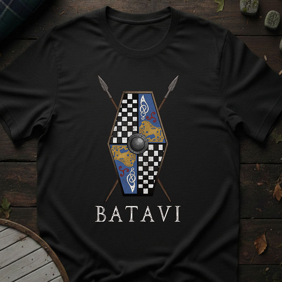 Black t-shirt with a shield and spear design and 'BATAVI' text on a wooden surface.