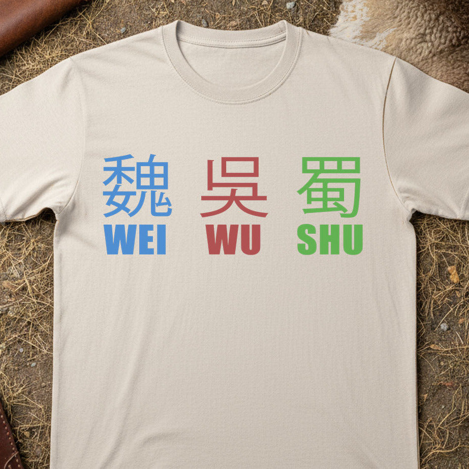 Beige  Three Kingdoms t-shirt with colorful text on a textured surface