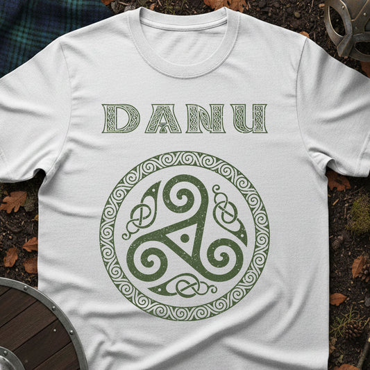 White t-shirt with green 'Danu' design on a natural background