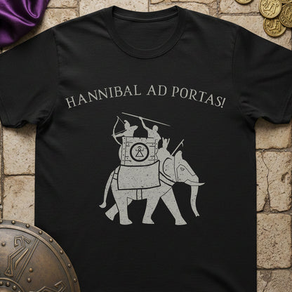 Black t-shirt with white graphic and text 'HANNIBAL AD PORTAS!' on a stone surface.