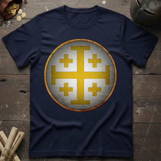 Navy blue t-shirt with a gold Jerusalem cross design on a wooden surface.