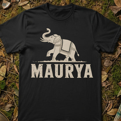 Black t-shirt with white elephant design and 'MAURYA' text on a natural background