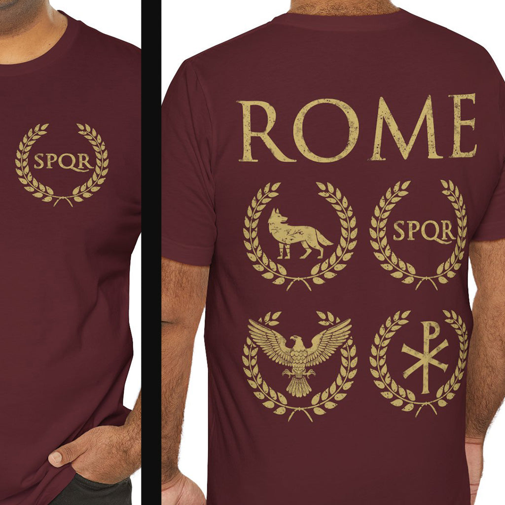 Maroon t-shirt with gold Roman-themed designs on a person wearing it.