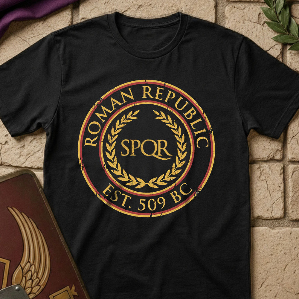 Black t-shirt with Roman Republic SPQR design on a stone surface
