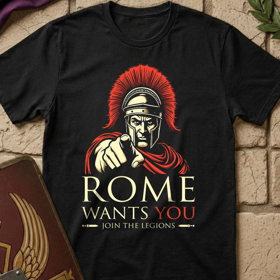 Black t-shirt with Roman warrior graphic and 'Rome Wants You' text on a stone surface.