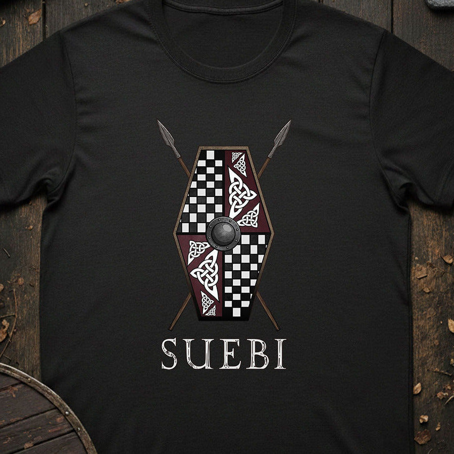 Black t-shirt with a shield design and 'SUEBI' text on a wooden background