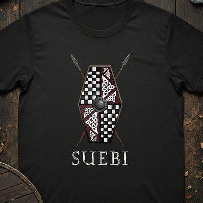 Black t-shirt with a shield design and 'SUEBI' text on a wooden background