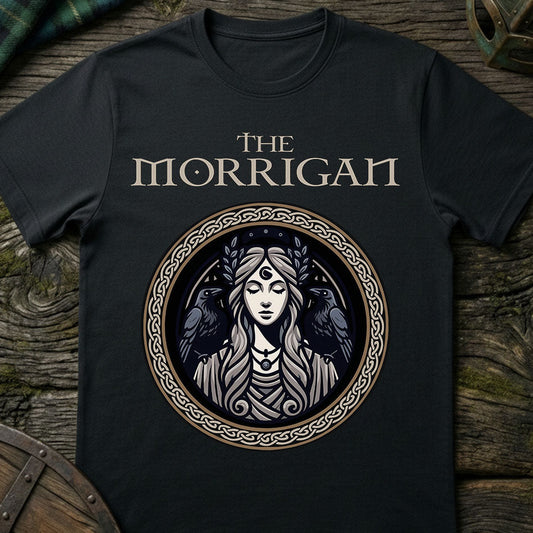 Black t-shirt with 'The Morrigan' design on a wooden surface