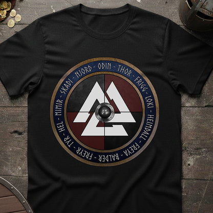 Black t-shirt with a Viking design on a wooden surface